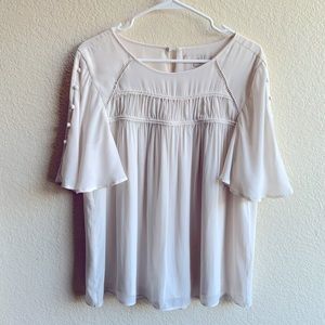 Half sleeve flowy chest detail blouse